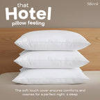 A stack of three luxurious Silkrest pillows resting on a bed, showcasing hotel-quality comfort and a soft cozy cover.